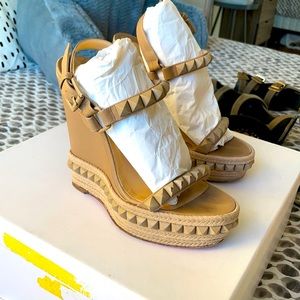 Christian Louboutin
Beige Leather Studded Wedge Size 38 Sandals